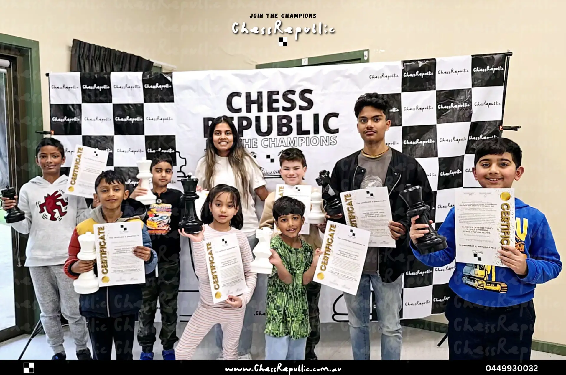 Children with trophies at a Chess Republic tournament
